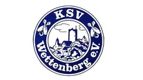 Logo des KSV Wettenberg: Rundes, blau-weißes Design mit der Silhouette einer Burg und eines Dorfs in der Mitte, umgeben von Kegeln und dem Schriftzug „KSV Wettenberg e.V.“.