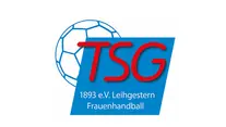 Blau-rotes Logo mit den Buchstaben „TSG“ und der Aufschrift „1893 e.V. Leihgestern Frauenhandball“ auf blauem Grund, mit angeschnittenem blauem Fußball im Hintergrund.